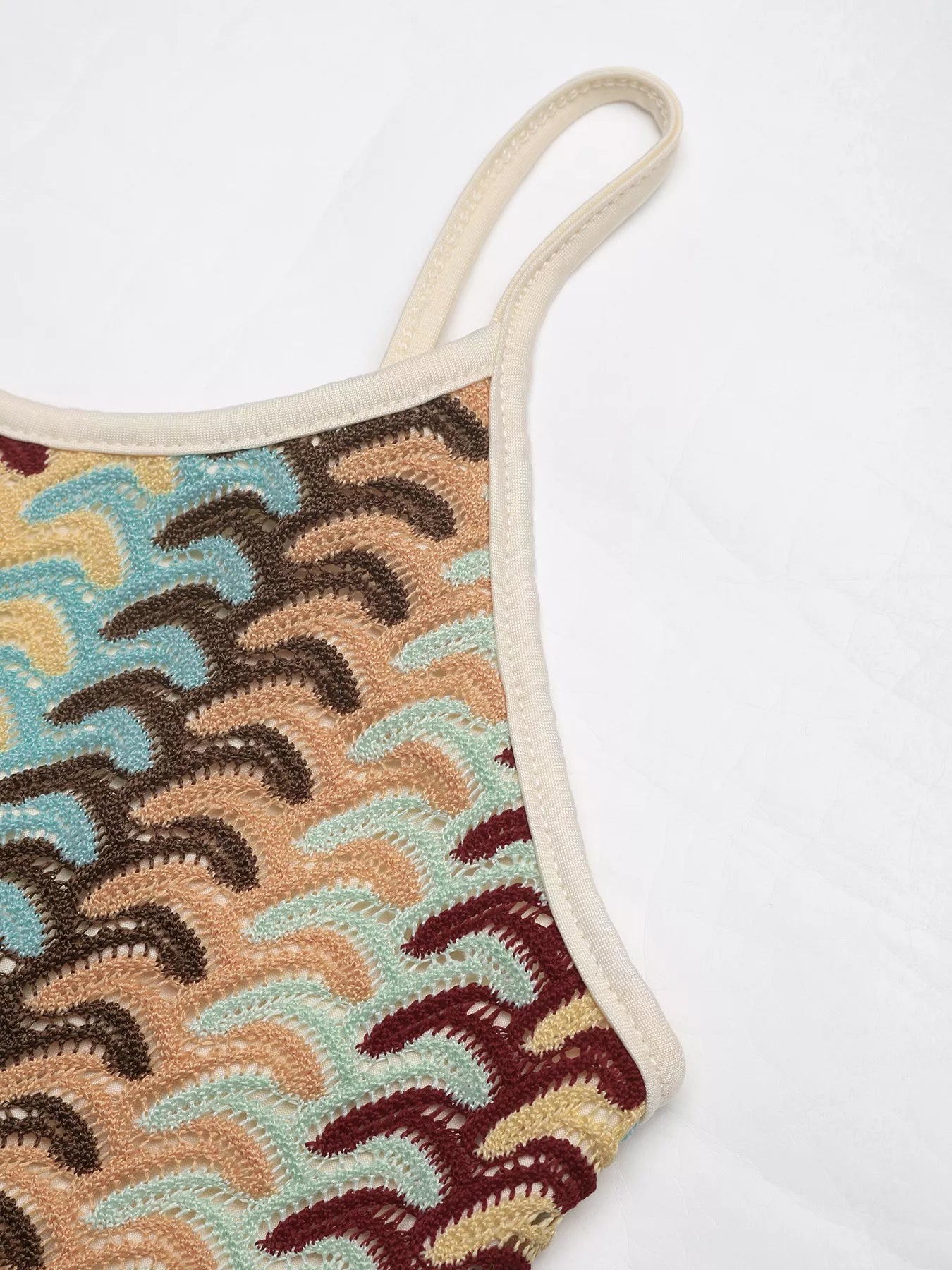 Close view of khaki striped midi dress strap and side seam detail