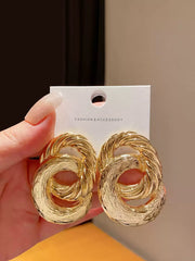 Bold Textured Gold Tone Intertwined Circle Stud Earrings