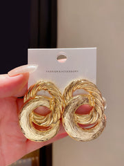 Bold Textured Gold Tone Intertwined Circle Stud Earrings