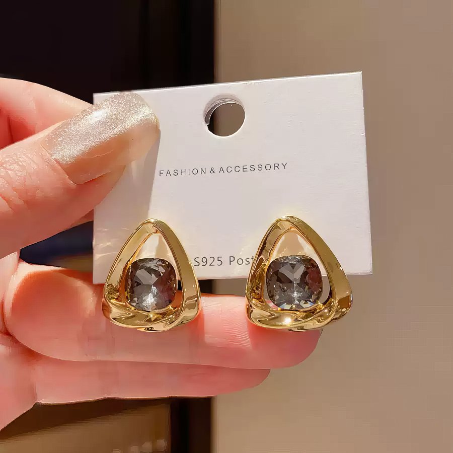 Chic Gold Tone Drop Earrings with Geometric Blue Smooth Accent