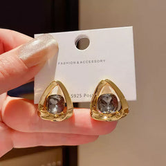 Chic Gold Tone Drop Earrings with Geometric Blue Smooth Accent