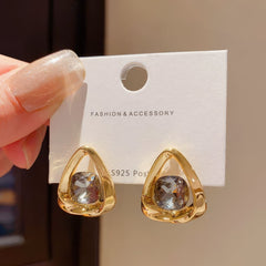 Chic Gold Tone Drop Earrings with Geometric Blue Smooth Accent