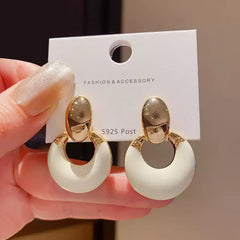 Exquisite Geometric Earrings with Smooth Toned Finish