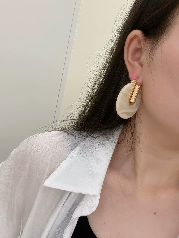 Gold Tone U-Hook Earrings with Shimmering Iridescent Round Disc
