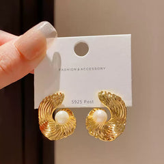 Refined Gold Tone Abstract Swirl Stud Earrings with Creamy White Faux Pearl