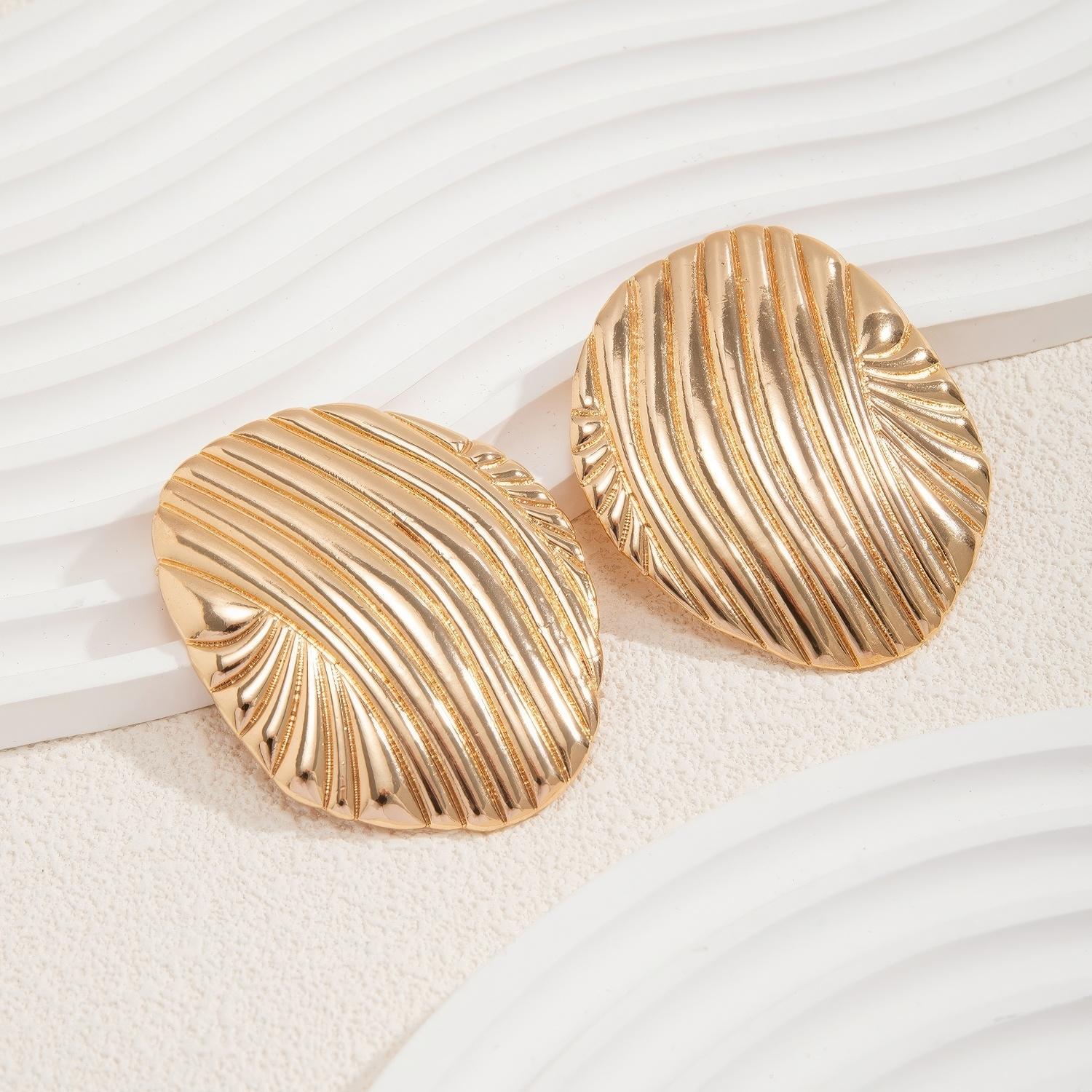 Sculptural Ribbed Shell Stud Earrings