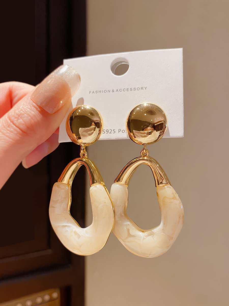 Stylish Gold Tone Drop Earrings with Round Top and Irregular Creamy White Geometric Inset