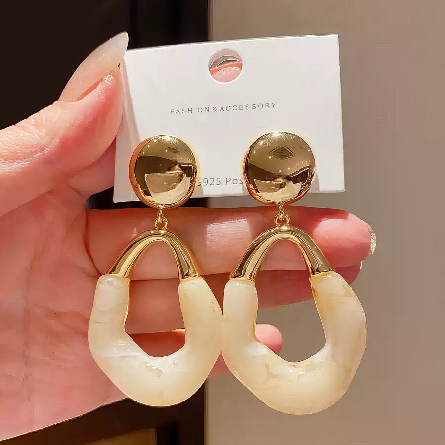 Stylish Gold Tone Drop Earrings with Round Top and Irregular Creamy White Geometric Inset