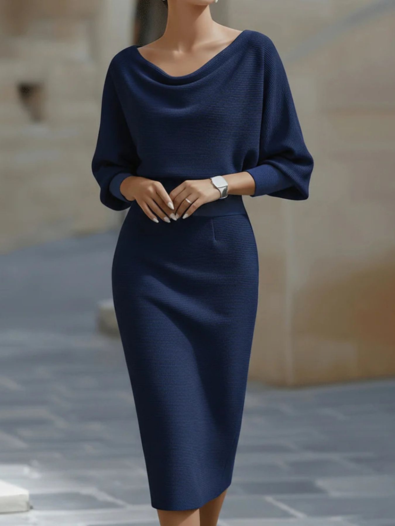Front view of a navy blue cowl neck knit bodycon dress with wide batwing sleeves