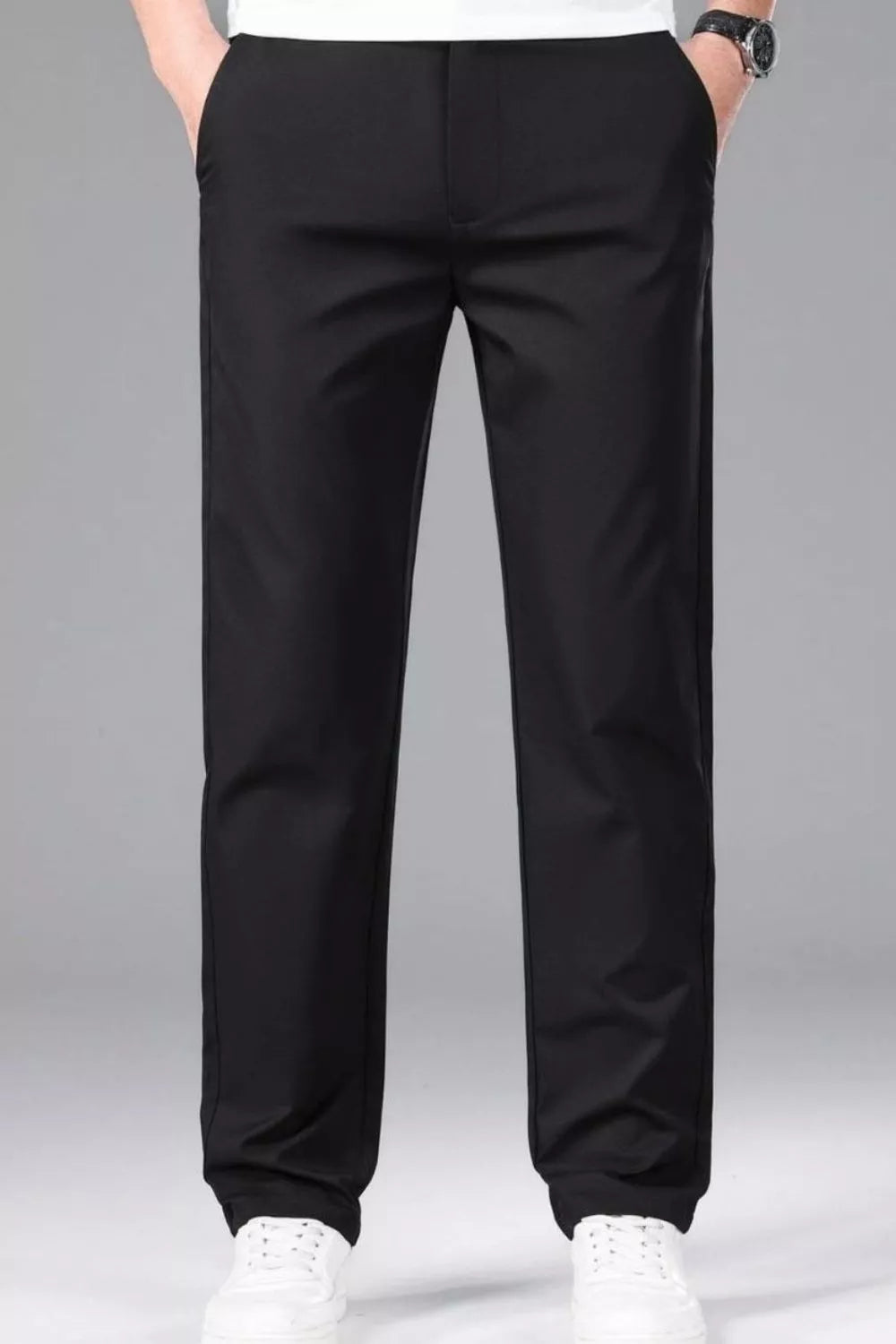 Men's black slim-fit stretch dress pants with pockets.