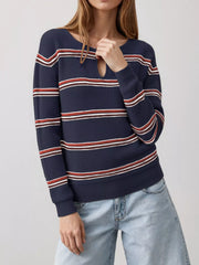 Front view of a dark blue striped ribbed knit top with a keyhole neckline