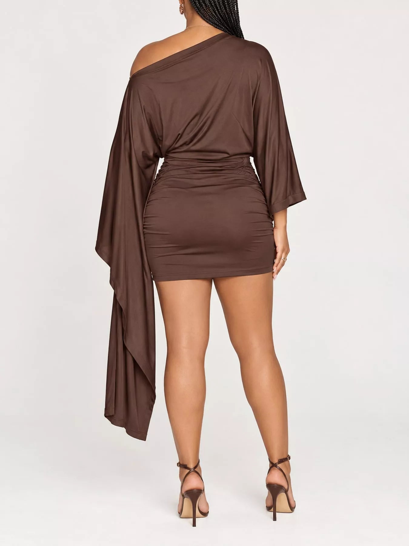 Full length studio back view of brown one shoulder draped bodycon mini dress
