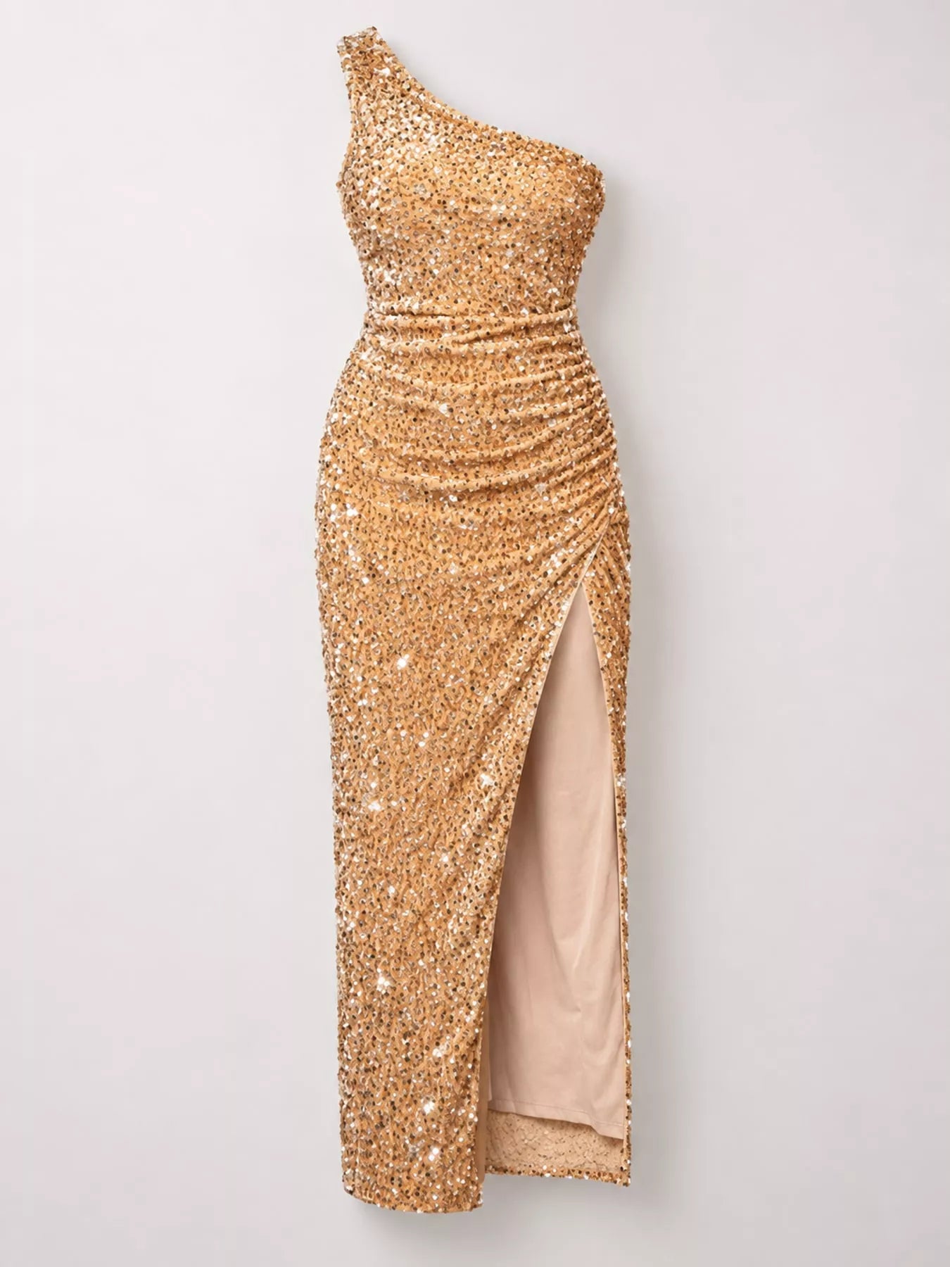 Gold sequin one shoulder evening dress shown flat front facing with a high slit