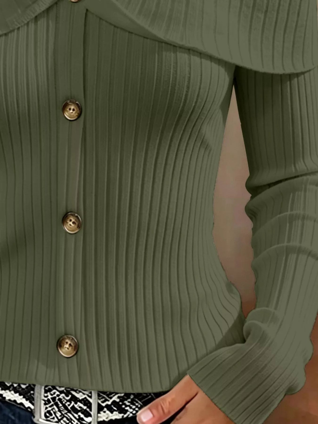 Close up of olive green cold shoulder ribbed knit top bodice showing ribbing and front buttons