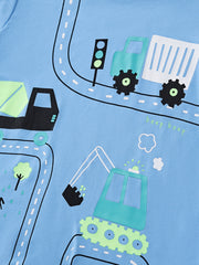 Close view of the truck and excavator road graphic on the sky blue children's t-shirt