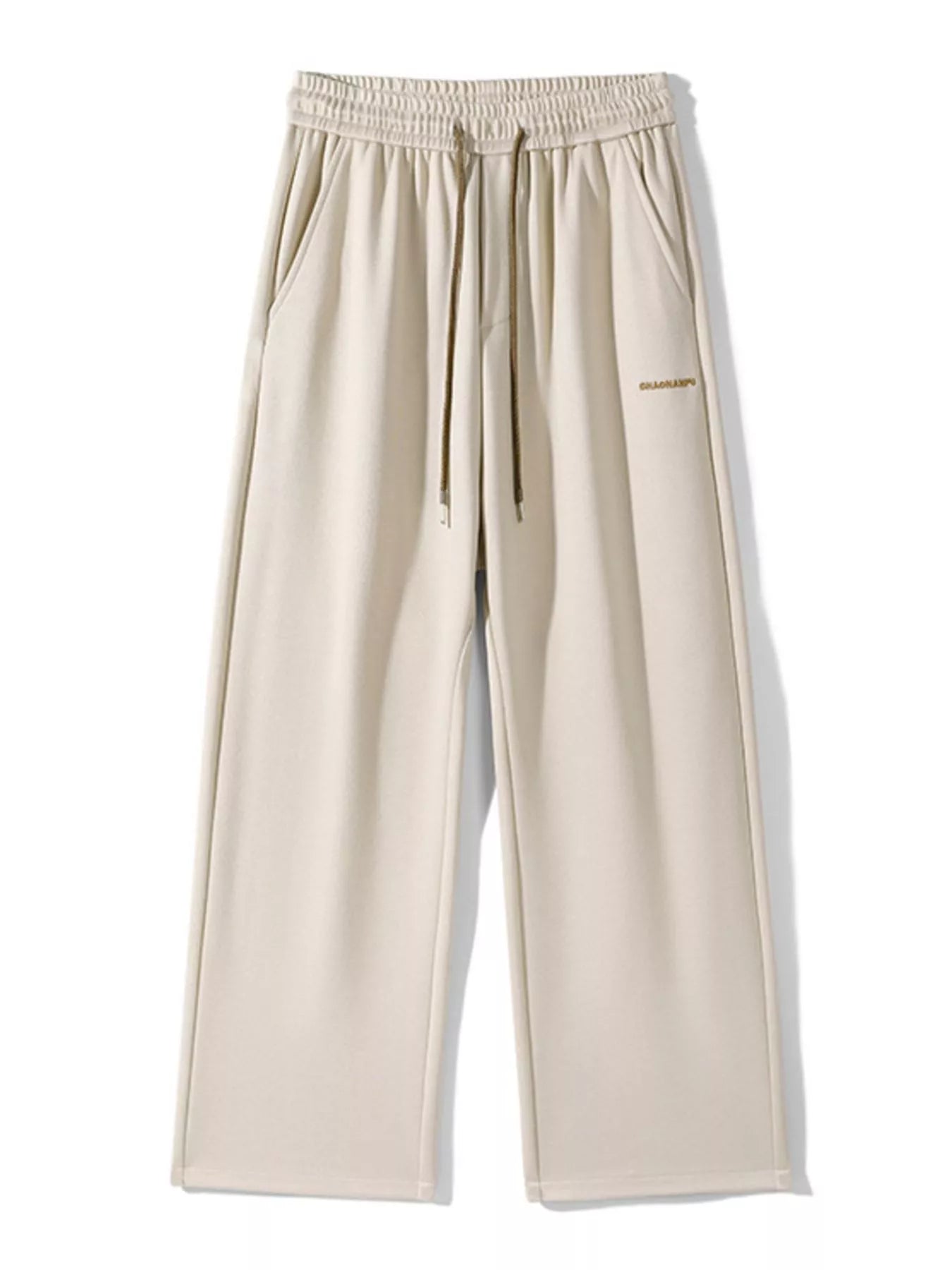 Men's loose fit casual pants with a drawstring waist and pockets.