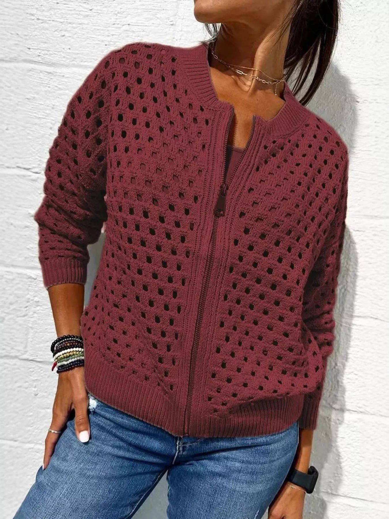 Front view of a wine red openwork crochet cardigan with a front zip
