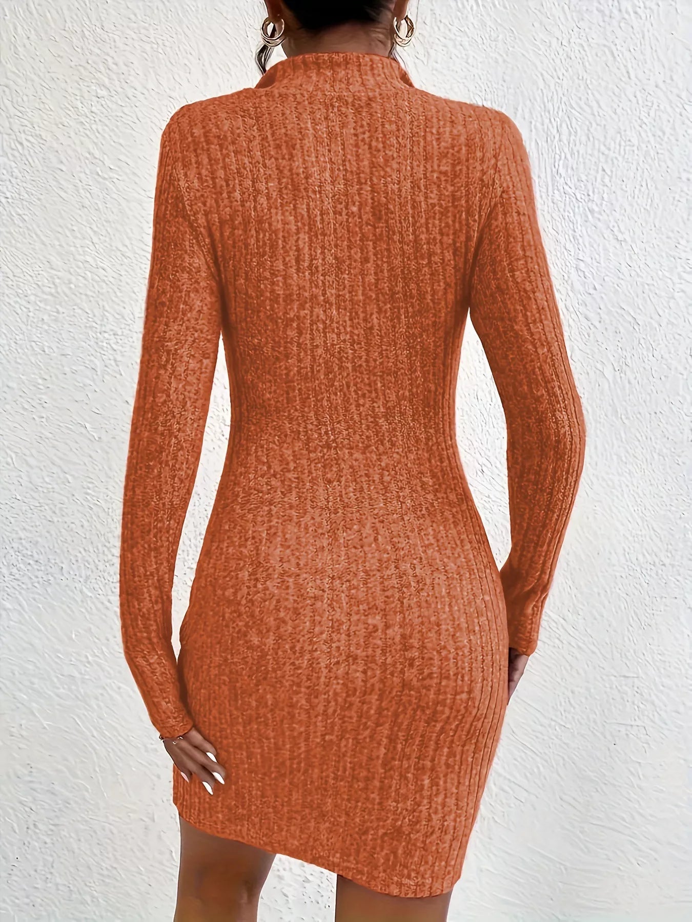 Back view of ochre ribbed knit bodycon mini dress with long sleeves