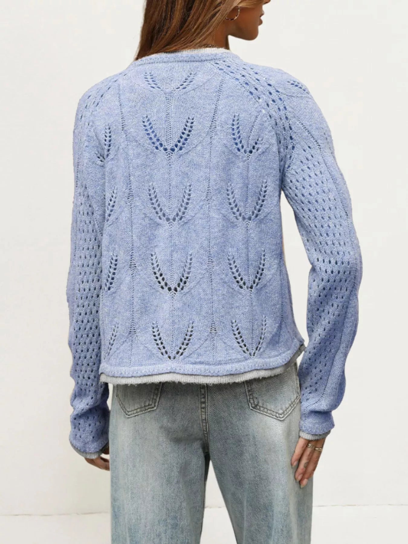 Back view of the light blue hollow out knit cardigan with leaf pattern
