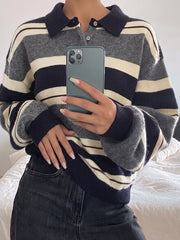 Close on-model front view of the striped sweater showing the polo collar and buttons