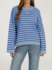 Front view of the blue striped dropped shoulder sweater with long sleeves and ribbed hem.