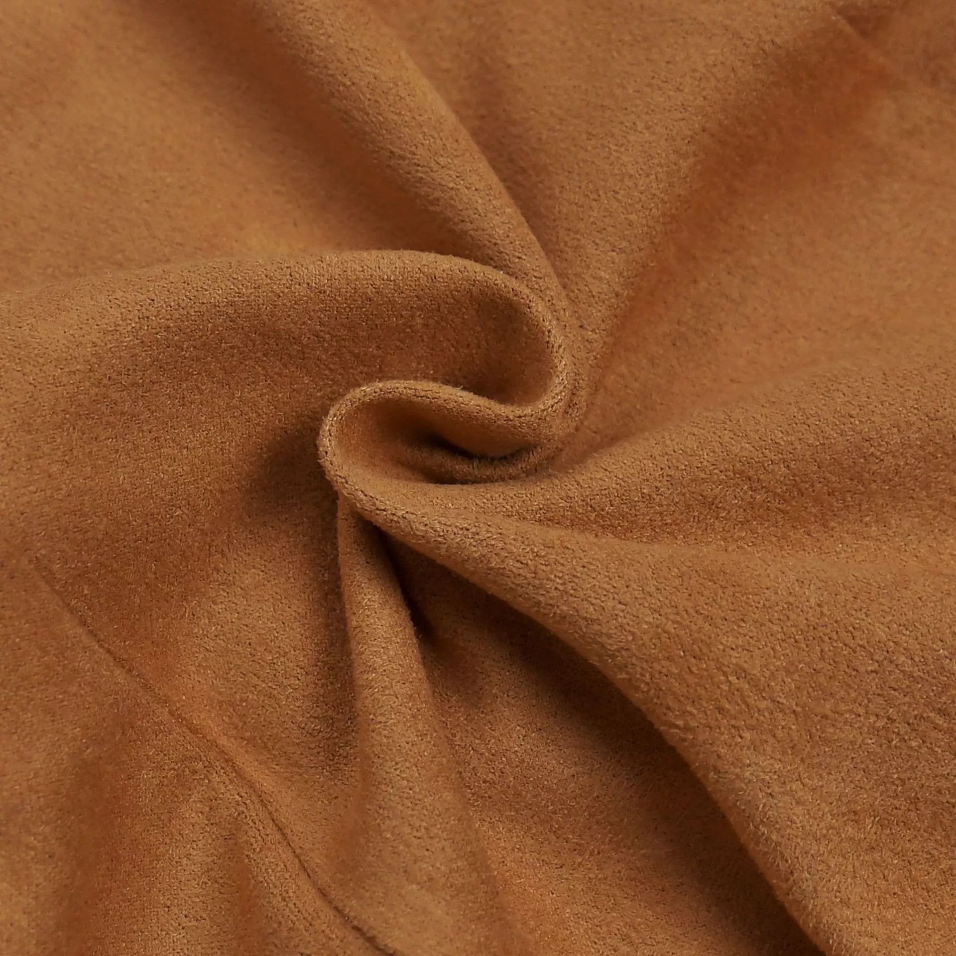 Caramel suede fabric swirl close up showing soft texture of bodycon dress