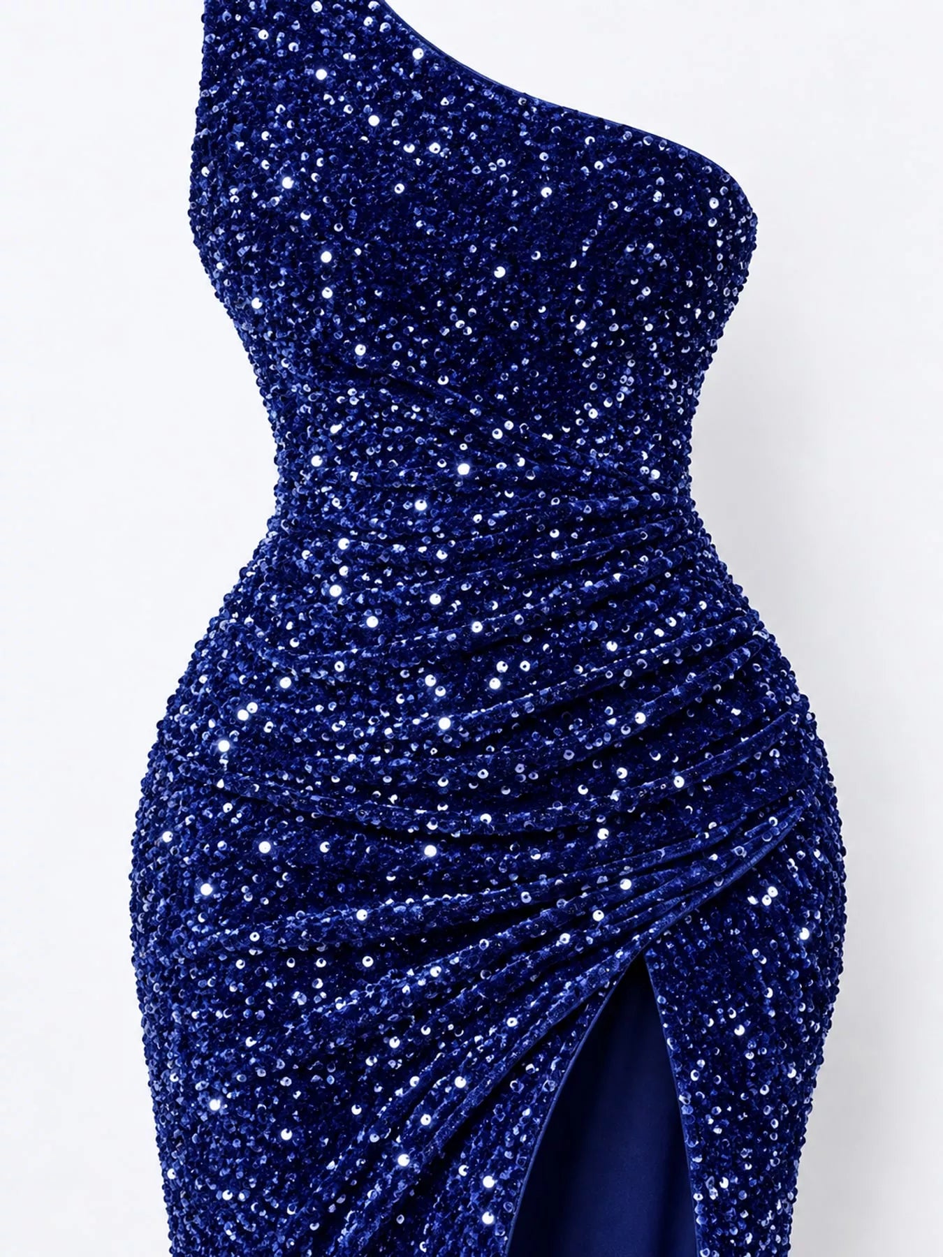 Royal blue sequin one shoulder evening dress close view showing the ruched waist and high slit