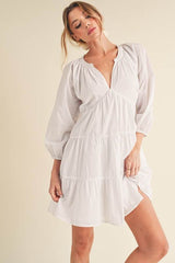 Aemi + Co Notched Balloon Sleeve Tiered Mini Dress