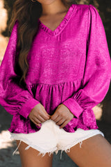 Blusa de manga larga con cuello en V y volantes