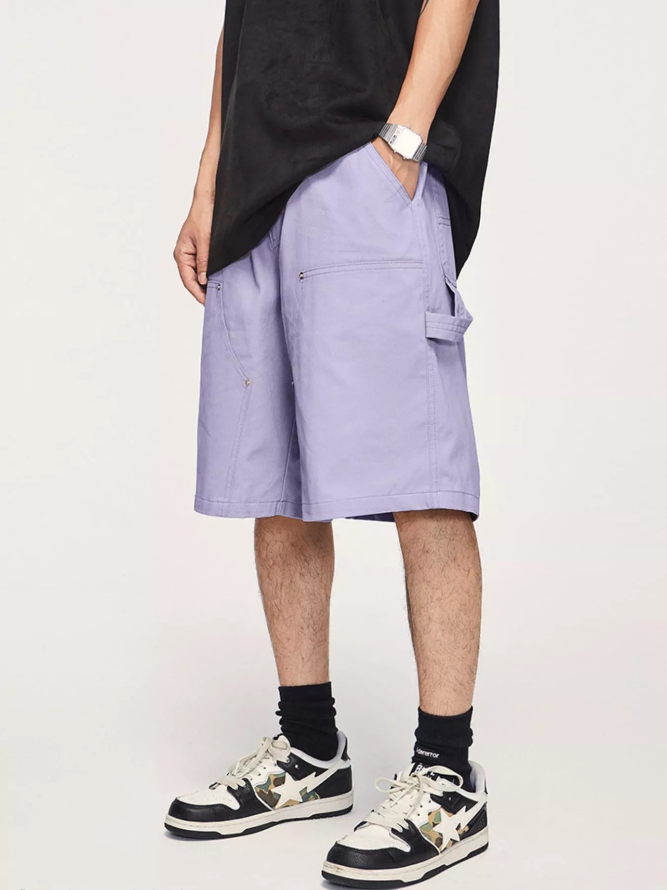 Men's casual loose fit shorts with a drawstring waist and pockets.
