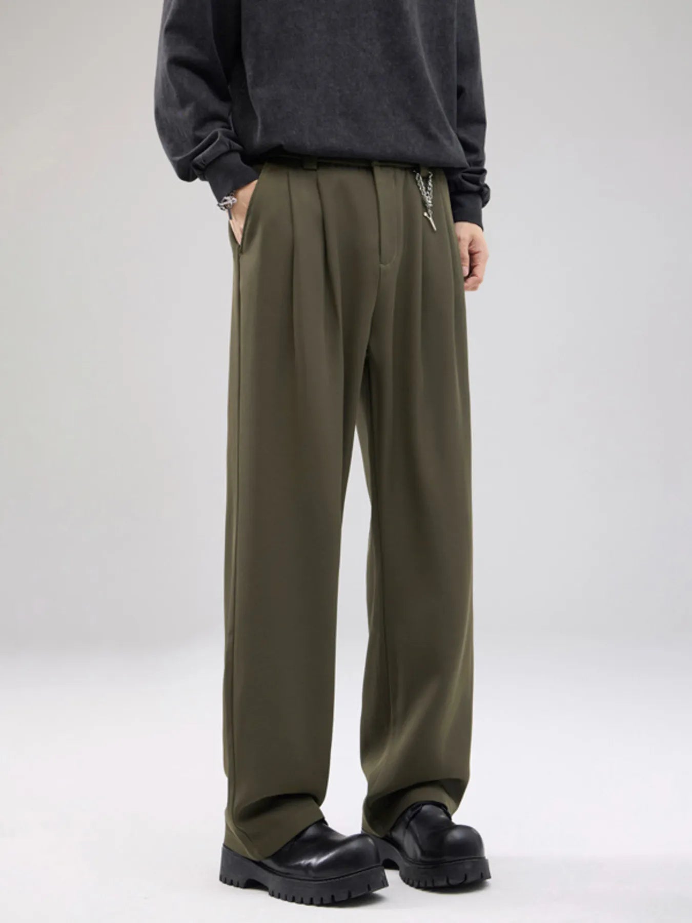 Men's wide leg pants with a drawstring waist and pockets.