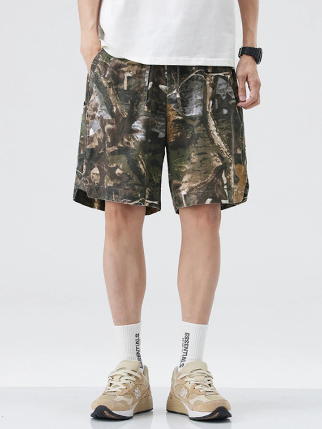 Men's loose fit shorts with a drawstring waist and pockets.