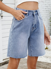 Women's washed denim shorts with raw hems and a non-stretch rayon blend.
