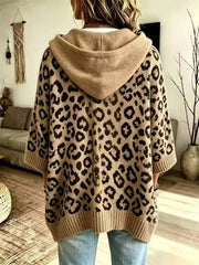 Back view of beige leopard print oversized hooded knit sweater with solid beige hood
