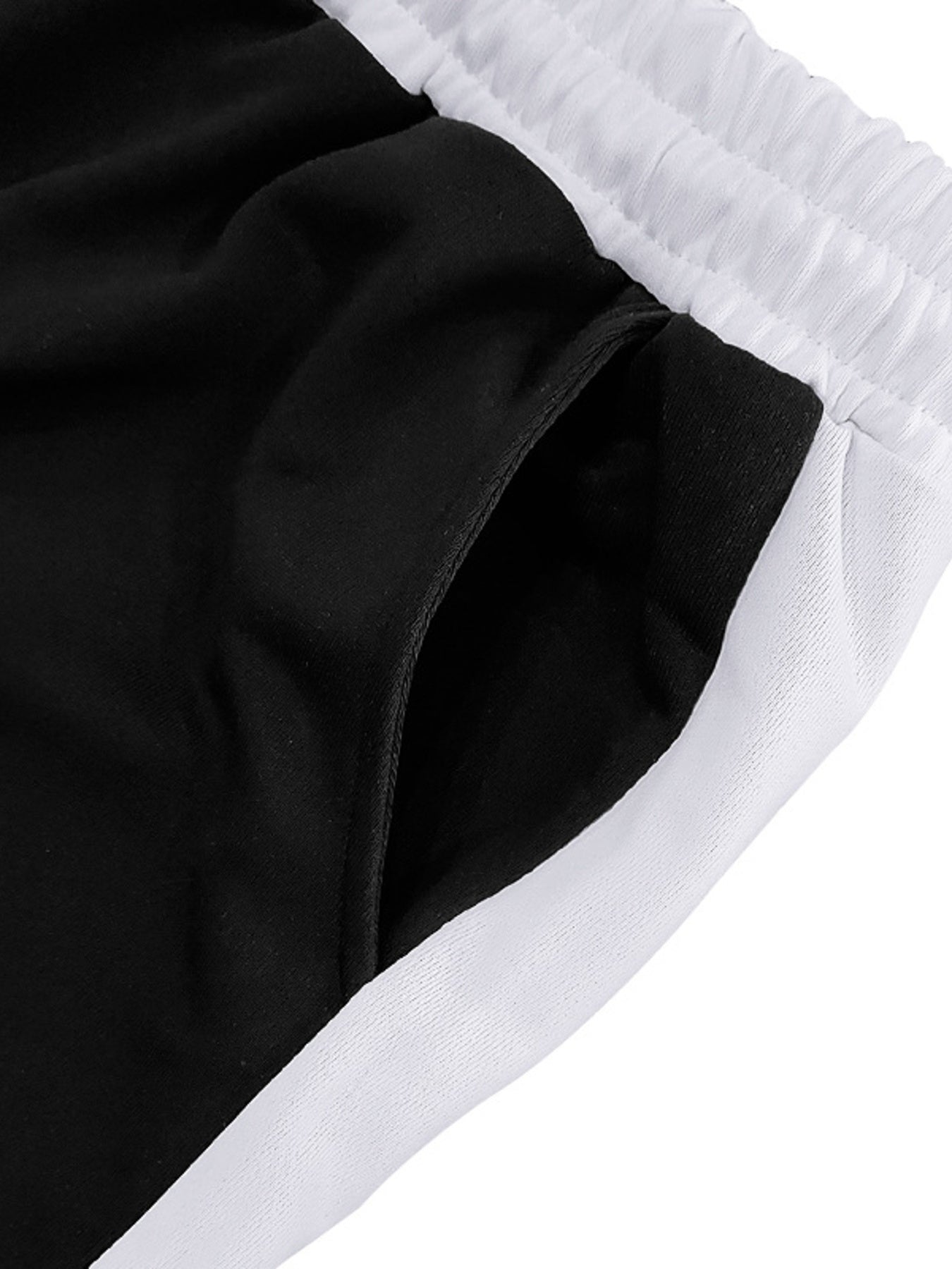 Men's contrast stripe sweatpants with a drawstring waist and pockets.