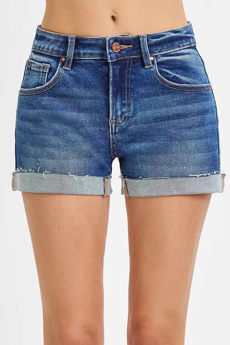 Women's low-rise cuffed shorts with raw hem detailing and a relaxed fit.