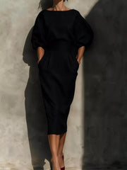 Black round neck puff sleeve midi dress with wide waistband front view