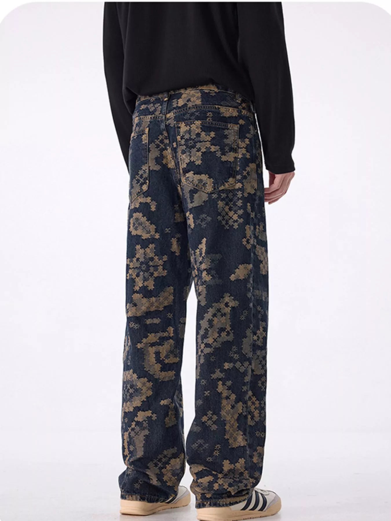 Men's printed wide leg cargo pants with pockets.