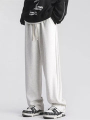 Men's loose-fit sweatpants with a drawstring waist in the Flower White color.