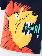 Close up of the roaring yellow lion face with an orange mane on the dark blue T-shirt