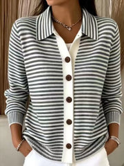 On-model front view of black and white striped collared cardigan with brown buttons
