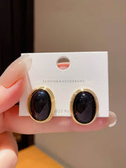 Black and Gold Toned Oval Clip On Earrings Black