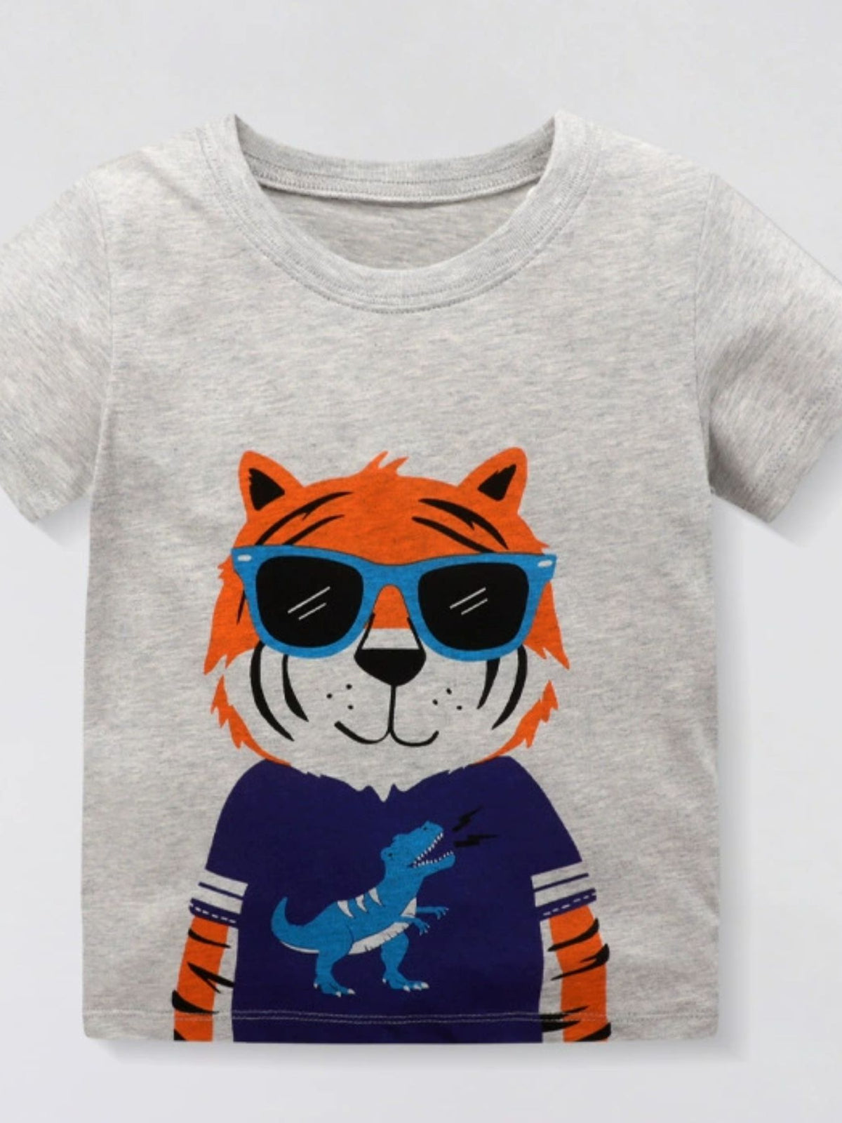 Front view of a light gray children's t-shirt with an orange tiger wearing blue sunglasses
