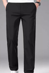 Men's black straight-leg casual pants with stretch fabric and a drawstring waist.