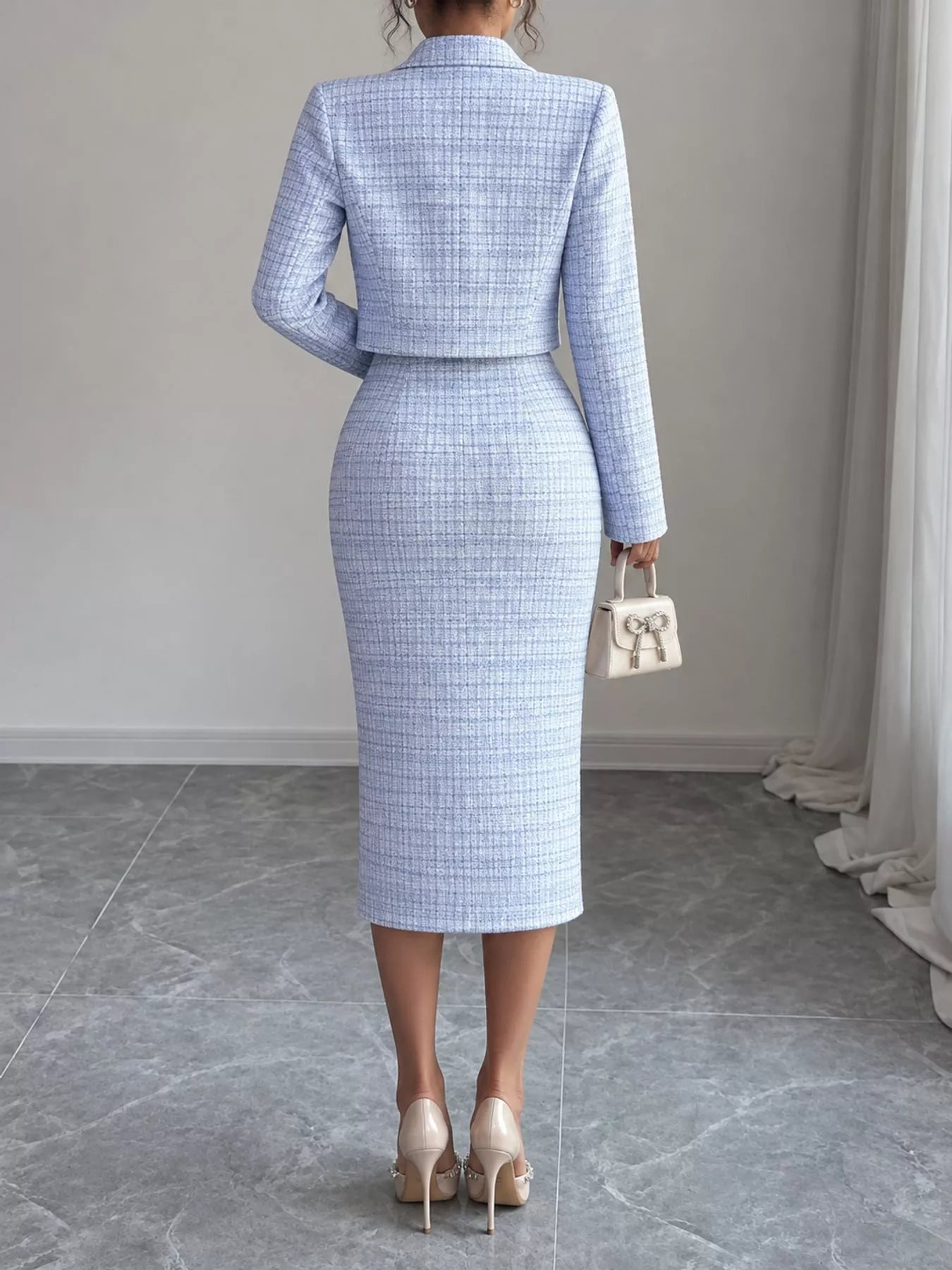 Back view of light blue tweed dress worn with the cropped cardigan