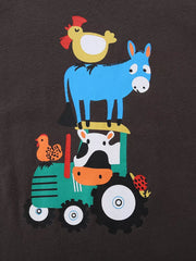 Close up of farm animal tractor print with blue donkey chicken cow and hen on chocolate children's t-shirt