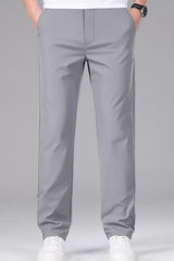Men's gray slim-fit stretch dress pants with pockets.