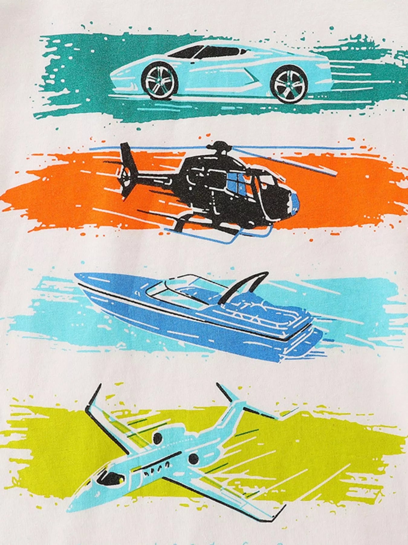 Close-up of colorful car helicopter boat and airplane graphics on cream children's t-shirt
