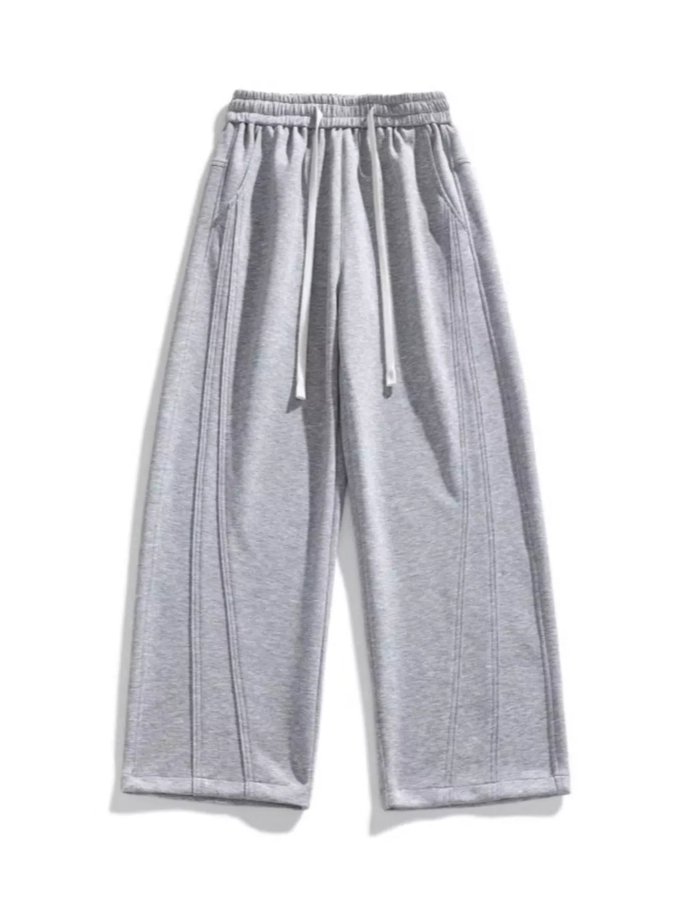 Men's light gray loose-fit wide-leg pants with a drawstring waist and pockets.