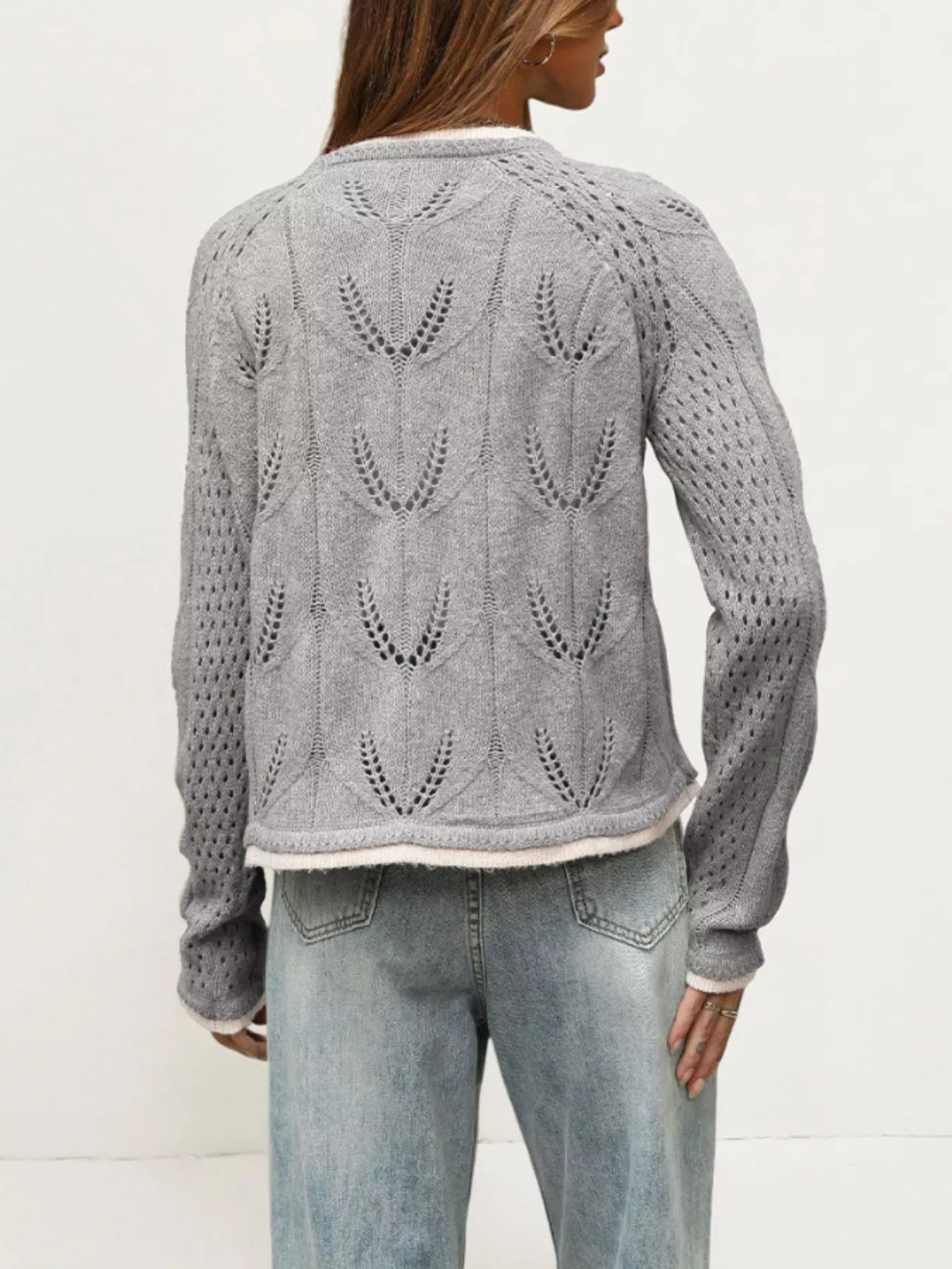 Back view of the gray hollow out knit cardigan with leaf pattern